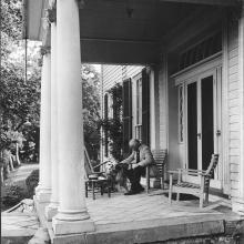 Gari Melchers on the porch at Belmont