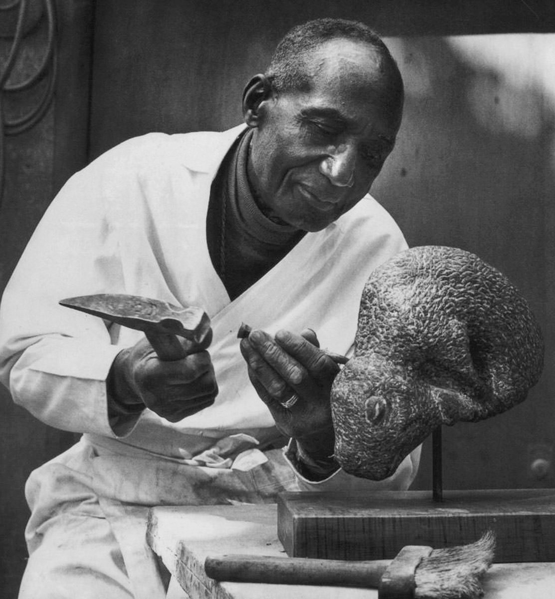 James W Washington Jr. working on one of his pieces. Photograph ...